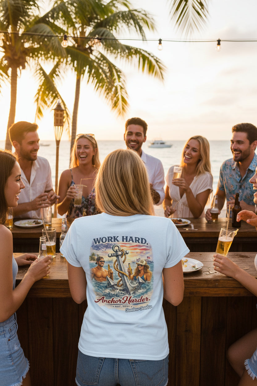 Light blue t-shirt with graphic design of two people holding an anchor and text on a white background