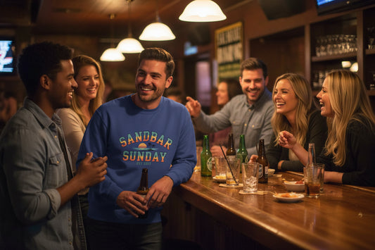 Blue sweatshirt with 'Sandbar Sunday' text on a white background